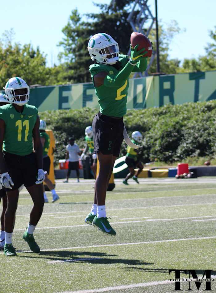 Wright leaps for a ball during a drill at Oregon fall camp.
